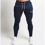 Calça Esportiva JoggersCom Bolso e Punho Ajustável