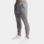 Calça Esportiva JoggersCom Bolso e Punho Ajustável