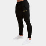 Calça Esportiva JoggersCom Bolso e Punho Ajustável
