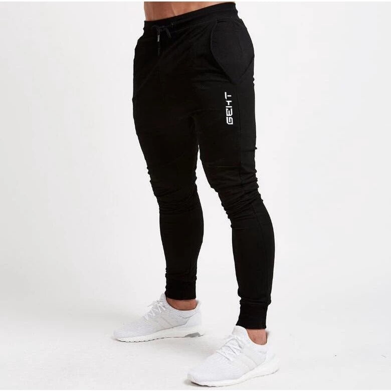 Calça Esportiva JoggersCom Bolso e Punho Ajustável